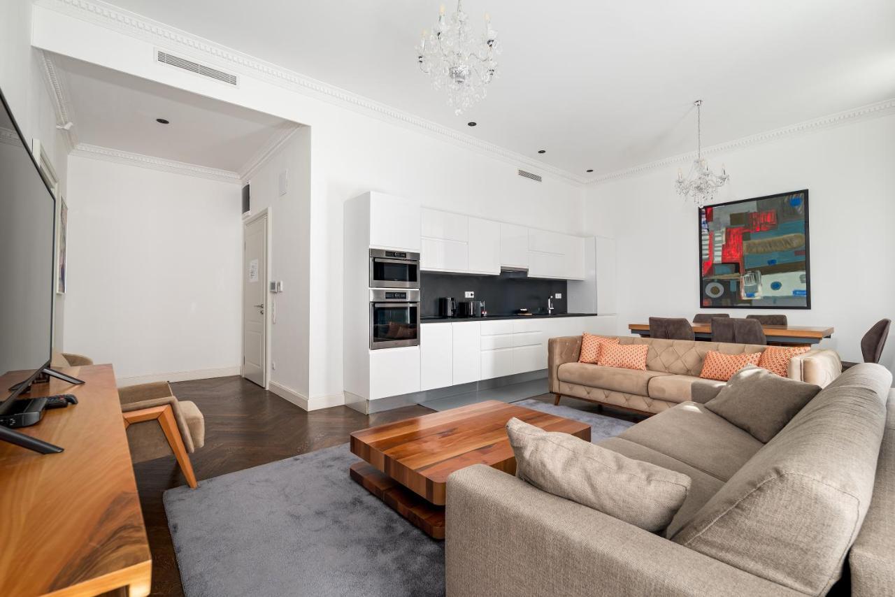 Zoya Luxury Residence Budapeste Exterior foto A living room in a modern apartment
