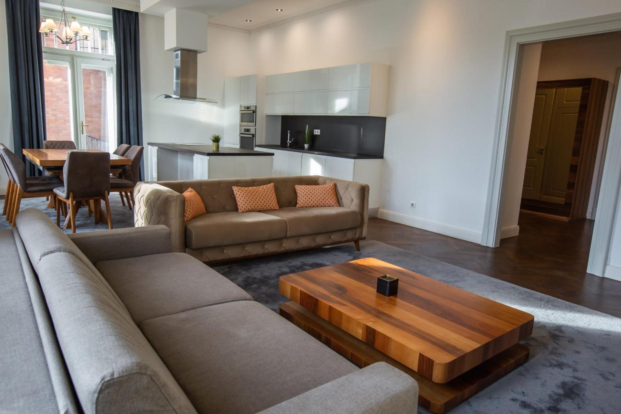 Zoya Luxury Residence Budapeste Exterior foto A living room in a serviced apartment in Amsterdam, Netherlands