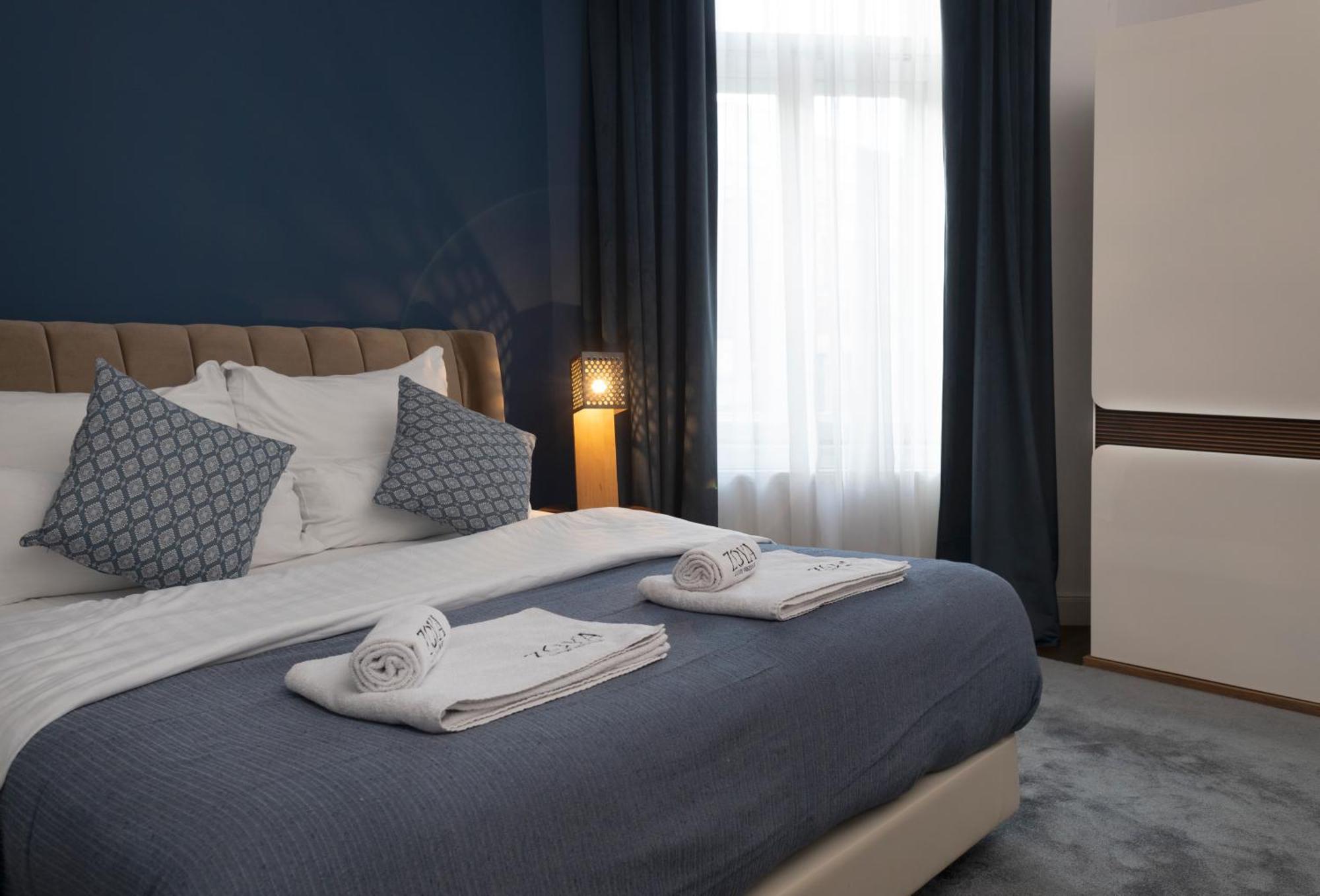 Zoya Luxury Residence Budapeste Exterior foto A bedroom at the hotel