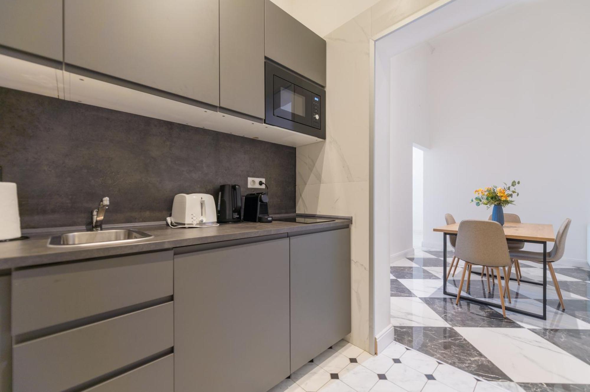 Zoya Luxury Residence Budapeste Exterior foto A modern kitchen